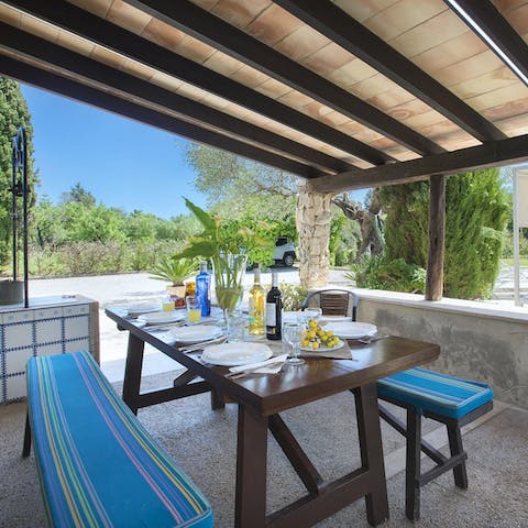 Enjoy tapas alfresco under the shade of the covered terrace