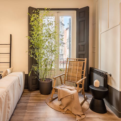 Open the doors to the Juliet balconies and recharge with a glass of wine in the living area