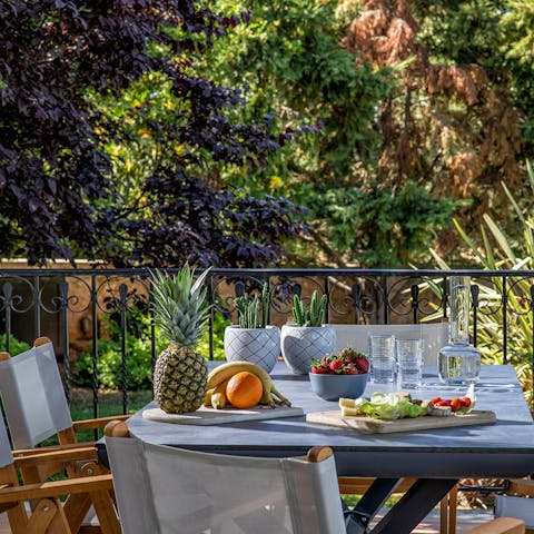 Show off your culinary talents on the barbecue and serve on the alfresco table