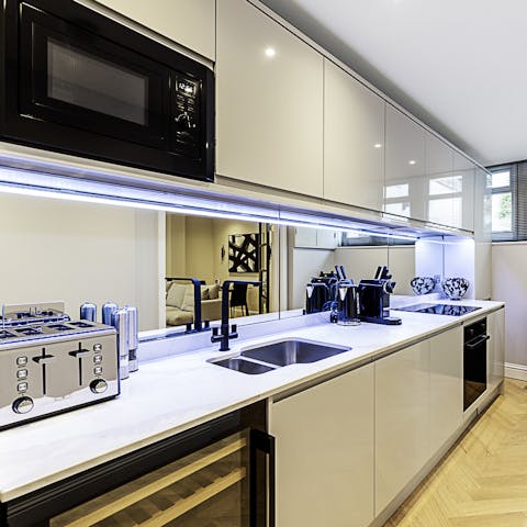 Rustle up a family feast in the sleek, modern kitchen