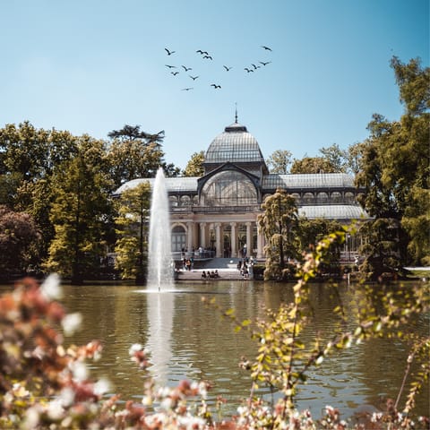 Start your mornings with a stroll through El Retiro Park, less than a ten-minute walk from your building