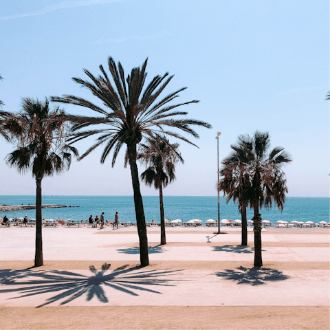 Catch the bus to Barceloneta Beach and bask in the sunshine