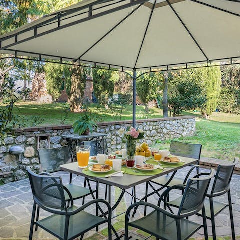 Sit down to an al fresco meal in the garden