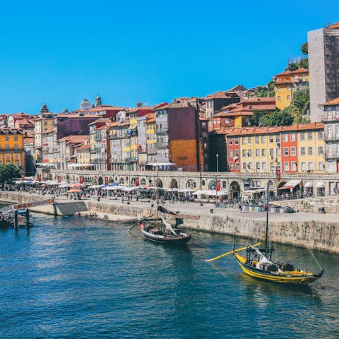 Wander past the pastel-hued homes lining Cais da Ribeira, thirty minutes on foot