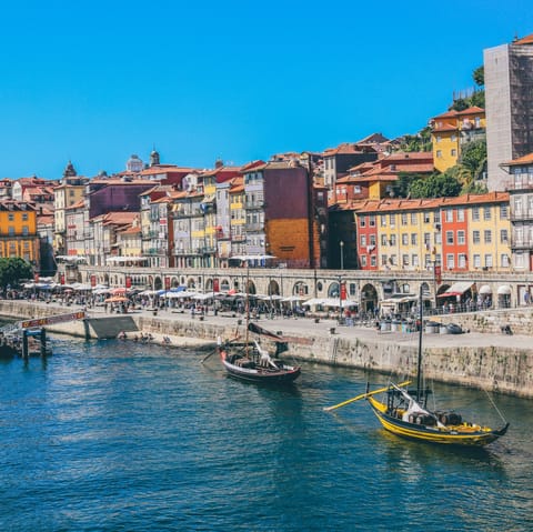 Wander past the pastel-hued homes lining Cais da Ribeira, thirty minutes on foot