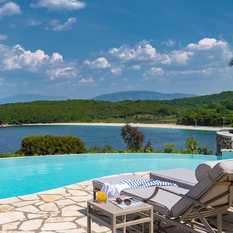 Jump into the infinity pool and cool off from the Corfu heat