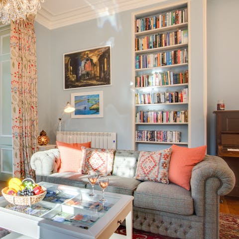 Cosy up with a good book from the host's collection 