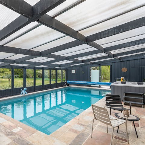Flit between the heated swimming pool and Jacuzzi in the wellness space