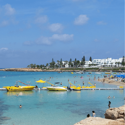Head to the crystal-clear shore of Fig Tree Bay, within walking distance