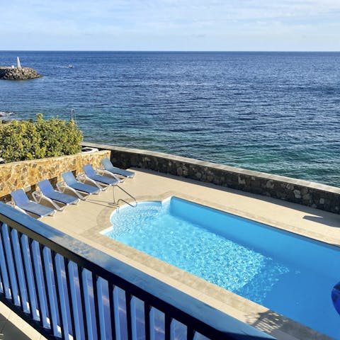 Swim in the private pool while admiring the gorgeous ocean views