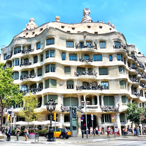 Visit Gaudí's impressive Casa Milà, an eighteen-minute walk away