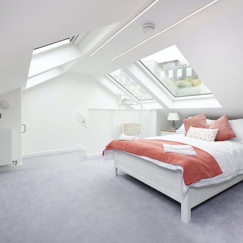 Wake up to beautiful sunrises through the skylights in the loft bedroom