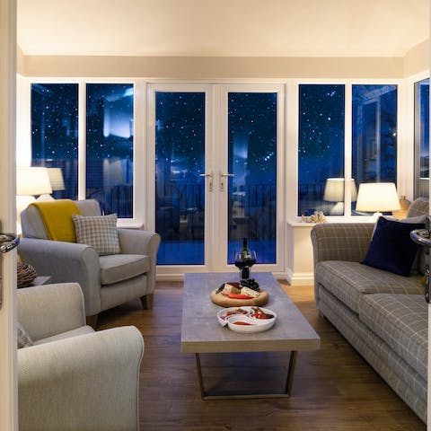 Gaze at the charming views through the French windows