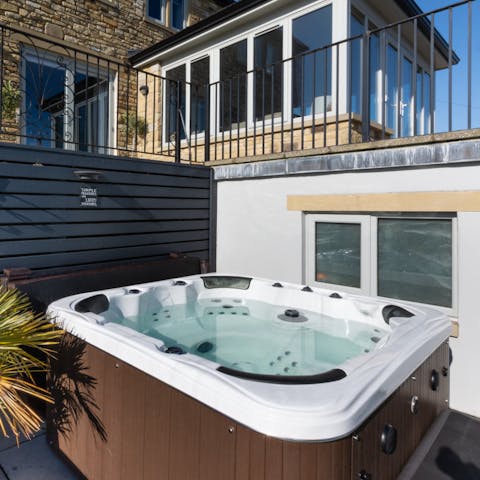 Enjoy the hot tub with views from the back garden all year round