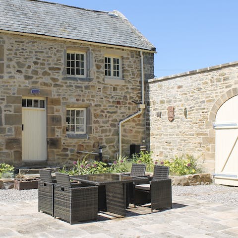 Soak up the morning sunshine in the courtyard
