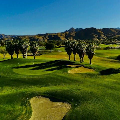 Head to one of many nearby golf courses