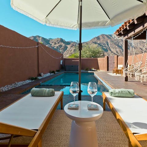 Admire the view of the mountains from your private pool