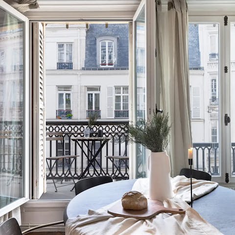 Soak up the magic of Paris from the little balcony