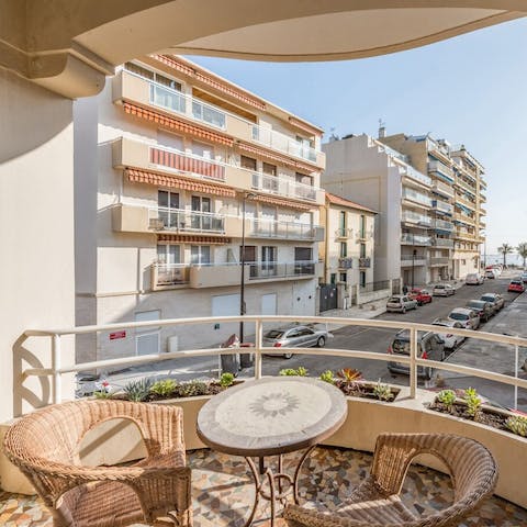 Have evening cocktails with a sea view on the balcony