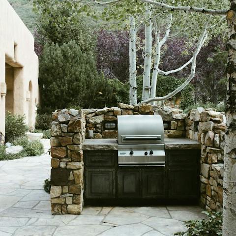 Enjoy a one of a kind grilling experience amidst the trees