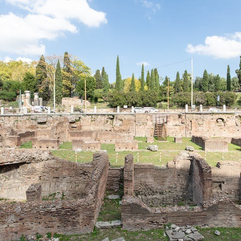 Walk five minutes to the Colosseum and ruins of the Roman Forum