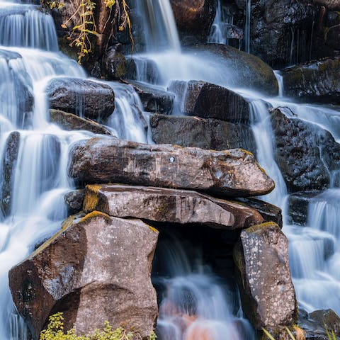 Have a stroll around the tranquil lakes and waterfalls of Virginia Water, also a sixteen-minute drive from this home