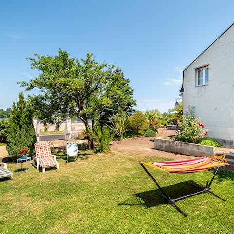 Treat yourself to an afternoon doze in the garden's hammock