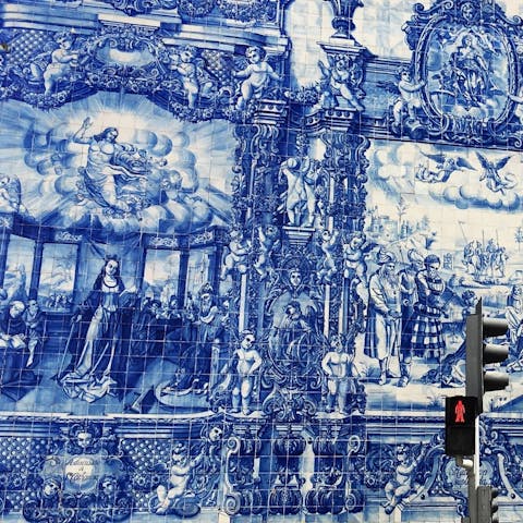 Admire the intricate azulejos of the Chapel of Souls, footsteps from your building