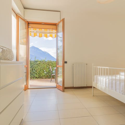 Slip out onto the balcony and greet the morning with views of the Alps