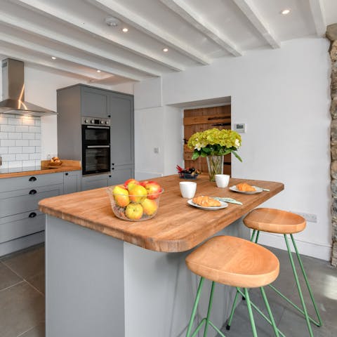 Prepare meals together around the kitchen island, listening to music and catching up as you go