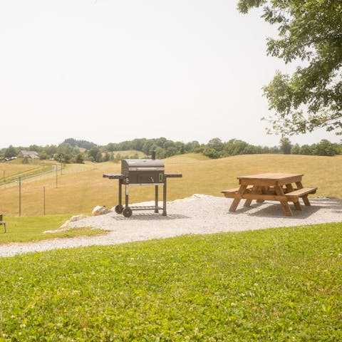 Dine alfresco with views of rolling green hills before you