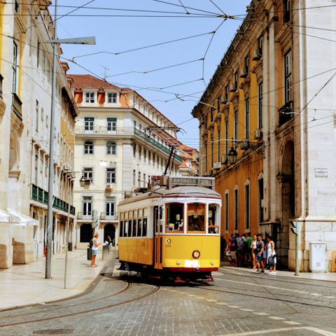 Catch the tram from Igreja Sta. Maria Madalena and wind through the steep hills to historic Alfama