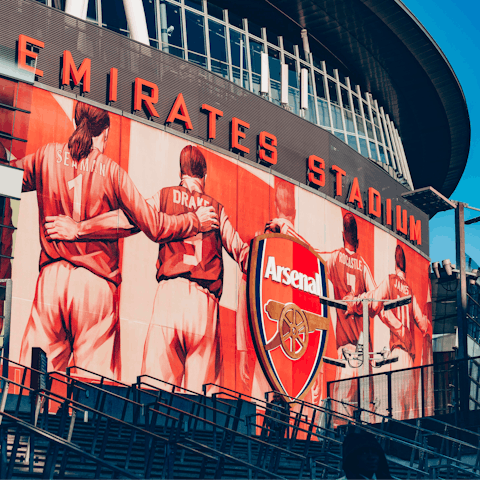 Watch a football match at the Emirates Stadium nearby