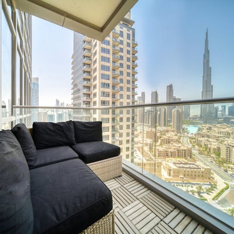 Take in stunning views of the Burj Khalifa from the balcony