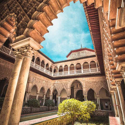 Stay a five-minute walk from the Royal Alcázar and soak up Seville's history
