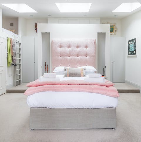 Drift off in the dreamy pink bed for a wonderful night's sleep