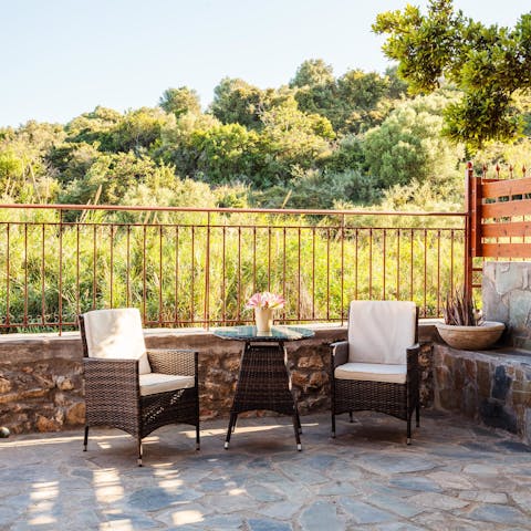 Enjoy a peaceful rest with a sundowner in the sitting area on your patio