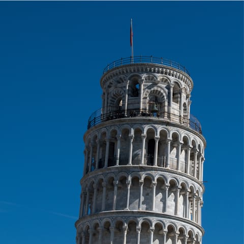 Visit the iconic sights of Pisa in a thirty-minute drive from home