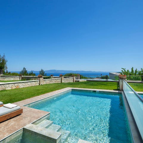 Enjoy sea views from your private pool and garden