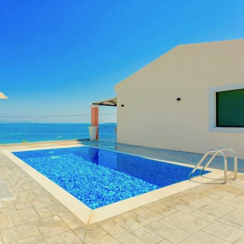 Admire the sea views with a swim in the private pool