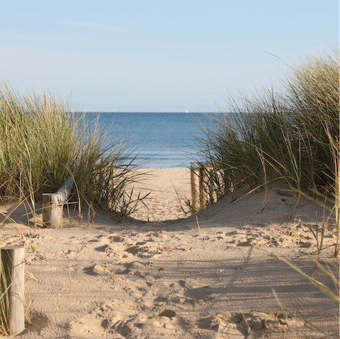 Breathe in the sea air at Aldeburgh Beach, just a twenty-minute drive away