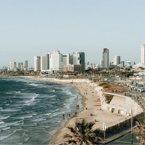 Stroll down to the soft pale sands of the nearby Tel Aviv Beach