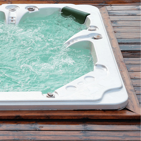 Enjoy a post-walk soak in the private outdoor hot tub