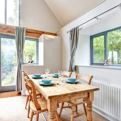 Look out onto the beautiful outdoors from the dining table