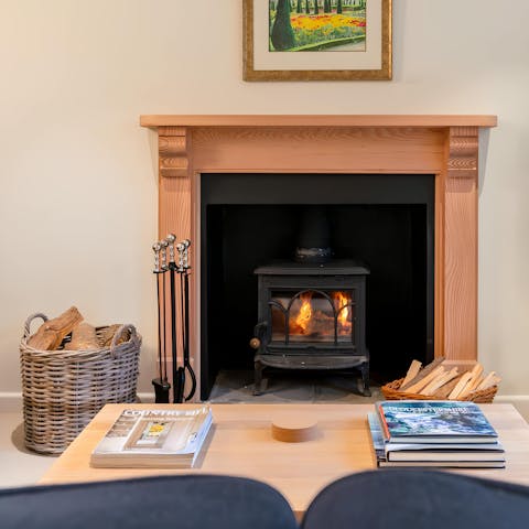 Get cosy in front of the fireplace on a chilly winter's evening