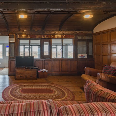 Admire the quirky salvaged railway carriage living room