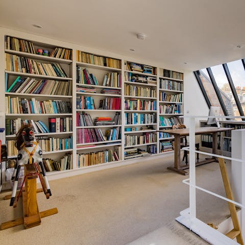 Admire the home's extensive library 