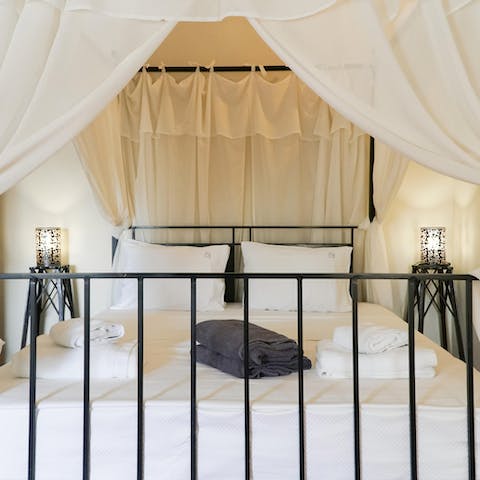 Wake up in the main bedroom's four-poster bed feeling rested and ready for another day of sightseeing