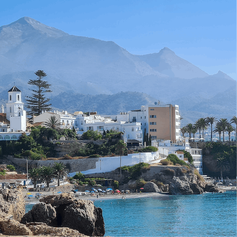 Spend an afternoon strolling through the pretty streets of nearby Nerja