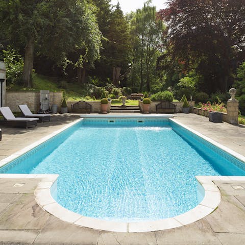 Dive into the the outdoor pool to cool down in the summer months